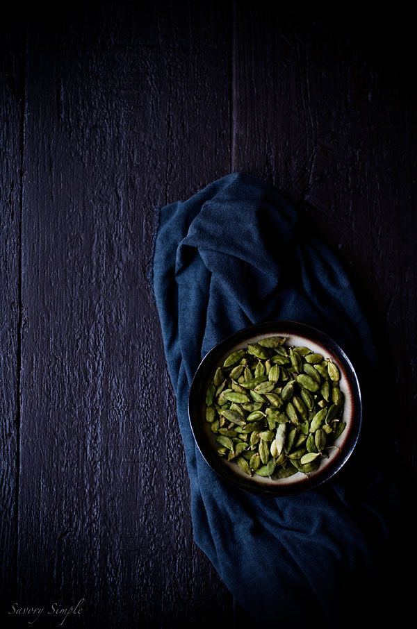 Bowl of green cardamom pods